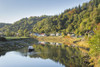 A small boat on the River Wye at Tintern. Poster Print by Loop Images Ltd. (18 x 12)