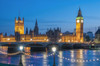 Big Ben and the Houses of Parliament above the River Thames at night. Poster Print by Loop Images Ltd. (18 x 12)