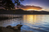 Sunset over Derwent Water from Ashness landing stage in the Lake District. Poster Print by Loop Images Ltd. (18 x 12)