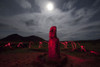 Moai at night beneath the light of the moon and surrounded by swirling hand held lights on Easter Island at Tongariki site, Chile; Easter Island, Isla de Pascua, Chile Poster Print by Michael Melford (17 x 11)