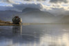 An abandoned boat with Ben Nevis in the distance. Poster Print by Loop Images Ltd. (20 x 13)