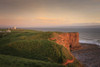 Nash Point Lighthouse near St Donats at sunset. Poster Print by Loop Images Ltd. (18 x 12)