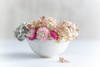Pastel dried flowers in a bowl. Poster Print by Loop Images Ltd. (19 x 12)