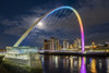 The Gateshead Millennium Bridge over the River Tyne at night. Poster Print by Loop Images Ltd. (20 x 13)