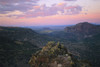 Gorges and rock formations on a vast desert landscape at sunset; New Mexico, United States of America Poster Print by Joel Sartore Photography (17 x 11)