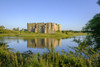 Carew Castle reflected in the mill pond. Poster Print by Loop Images Ltd. (20 x 13)