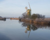 Turf Fen mill reflected in the River Ant at How Hill. Poster Print by Loop Images Ltd. (18 x 14)