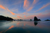 Beautiful sunrise over rock formations at Indian Beach on the Oregon coast; Oregon, United States Of America Poster Print by Craig Tuttle (17 x 11)