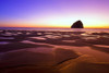 Morning light adds beauty to Haystack Rock, Cape Kiwanda State Natural Area, Oregon, USA; Pacific City, Oregon, United States of America Poster Print by Craig Tuttle (17 x 11)