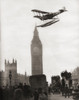 Alan Cobham coming in to land on the River Thames, London in his de Havilland DH.50J floatplane after flying to Australia and back in 1926.  From These Tremendous Years, published 1938. Poster Print by Ken Welsh (12 x 16)