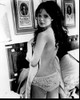 Madeline Smith Looking Over Shoulder Holding Sheet Black And White Photo Print (8 x 10)