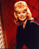 Connie Stevens In Black With Red Background Photo Print (8 x 10)