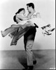 Rock Hudson Carrying Elizabeth Taylor Black And White Photo Print (8 x 10)