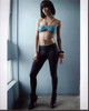 Dominique Tipper In Leather Pants And Aqua Bikini Top Photo Print (8 x 10)