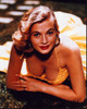 Anita Ekberg In Yellow Dress Laying In Grass Photo Print (8 x 10)