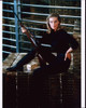 Tania Mallet Holding Gun And Sitting On Gold Bricks In Goldfinger Photo Print (8 x 10)