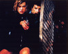 Milla Jovovich And Eric Mabius Next To Cage Resident Evil Photo Print