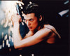 Milla Jovovich Holding Gun N Front Of Sparks In Resident Evil Photo Print (8 x 10)