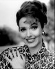 Amy Yasbeck Smiling In Animal Print Black And White Photo Print (8 x 10)