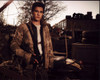 Drew Roy In Camo Jacket With Gun In Falling Skies Photo Print (8 x 10)