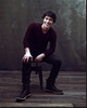 Bob Morley On Stool In Red Top Photo Print (8 x 10)