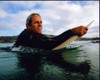 Gregory Harrison In Ocean On Surfboard Photo Print