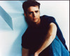 Jason Priestley Sitting In Jeans With Knee Up Photo Print (8 x 10)