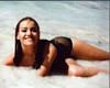Claudine Auger Laying In Water Photo Print (8 x 10)