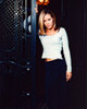 Maria Bello Leaning On Gate Photo Print (8 x 10)
