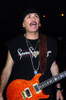 Carlos Santana at rehearsals at the 33rd Annual American Music Awards, Shrine Auditorium in Los Angeles, CA, November 22, 2005. ph: Ron Wolfson / (Carlos Santana0770) Poster