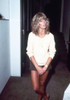 Farrah Fawcett wearing a sweater and shorts, 1970s. Photo: Oscar Abolafia (farrahfawcett044) Poster