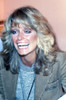 Farrah Fawcett wearing a cordoroy jacket and grey sweater, 1970s. Photo: Oscar Abolafia (farrahfawcett042) Poster