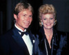 John Denver, Barbara Sinatra 1984. Photo by Adam Scull (John Denver Barbara Sinatra11850) Poster