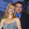 Miami, FL 11-2-2002. John Travolta and wife Kelly Preston prior to Kelly being inducted into the Hall of Fame at Miami Childrens Hospital at the Inter Continental Hotel. Photo By Adam Scull (Travolta Preston7722) Poster