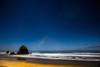 USA- Oregon. Cannon Beach and Haystack Rock stars showing during blue light. Poster Print - Darrell Gulin