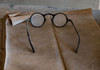 Old glasses collect dust in an old general store-California-USA. Poster Print - Betty Sederquist