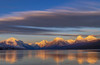 Winter sunset on mountain peaks over Lake McDonald in Glacier National Park-Montana-USA Poster Print - Chuck Haney