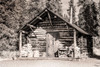 Small- rustic log home in sepia. Poster Print - Janet Muir