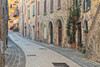 Italy- Umbria. Street leading up to the main square in the historic town of Montone. Poster Print - Julie Eggers