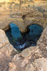Portugal. Heart-shaped rock design on shore. Poster Print - Gallery Jaynes
