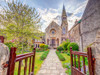 Church in Malmesbury Poster Print - Assaf Frank