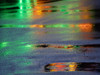 Lights reflected in puddles on asphalt path Poster Print - Images Merrill