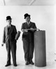 From Left, Stan Laurel, Oliver Hardy, Celebrating The Fourth Of July, Ca. 1930S Poster Print