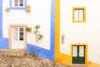 Europe-Portugal-Obidos-Colorful exterior of houses Poster Print - Jaynes Gallery # VARPDXEU23BJY0073