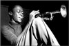 Miles Davis Sitting Sitting with trumpet Poster Poster Print - Item # VARXPS1318