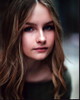 Olivia Dejonge Headshot In Green Top Photo Print - Item # MVM58649
