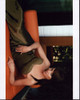 Melinda Clarke Laying On Side In Strapless Green Dress Photo Print - Item # MVM56806