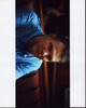Jim Parrack Sitting In Blue Striped Shirt Photo Print - Item # MVM59864