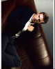 Teddy Sears On Brown Leather Couch Photo Print - Item # MVM59764