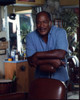 John Amos Leaning On Chair Photo Print - Item # MVM59552